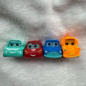 Disney neon pop doorable cars bundle. Mater, Lighting McQueen, Flo, and Doc.